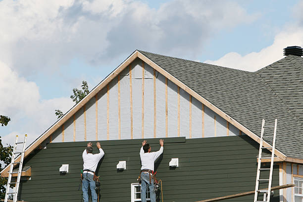 Professional Siding Contractor technician working in Salem, MA